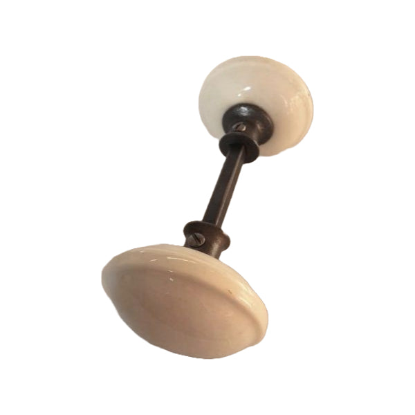 Pair of White Enamel Ridged Doorknobs image 0